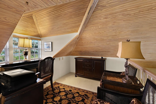 carpeted home office featuring lofted ceiling and wooden ceiling