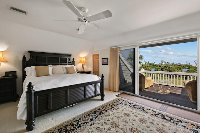 bedroom with light carpet, access to exterior, and ceiling fan