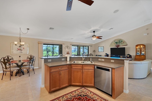 kitchen featuring an island with sink, dishwasher, sink, hanging light fixtures, and crown molding