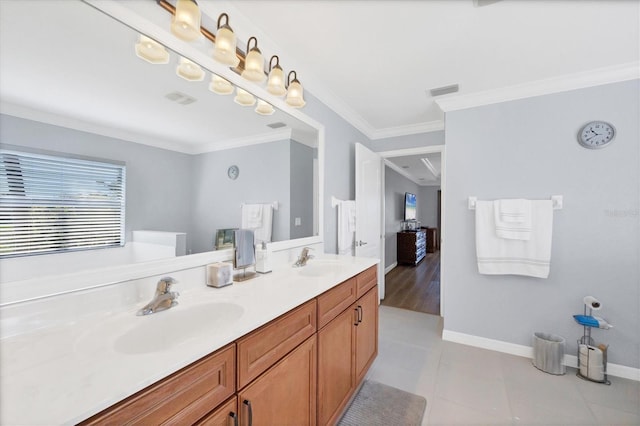 bathroom featuring vanity and crown molding