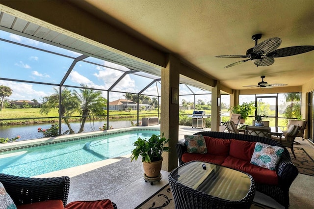 view of pool featuring a water view, a patio, a lanai, and an outdoor hangout area