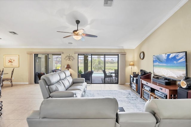 39 Tournament Rd, Rotonda West, FL 33947 - living area with light tile patterned floors, a ceiling fan, ornamental molding, baseboards, and vaulted ceiling
