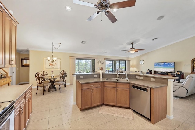 39 Tournament Rd, Rotonda West, FL 33947 - kitchen featuring stainless steel appliances, a sink, ceiling fan, open floor plan, and crown molding