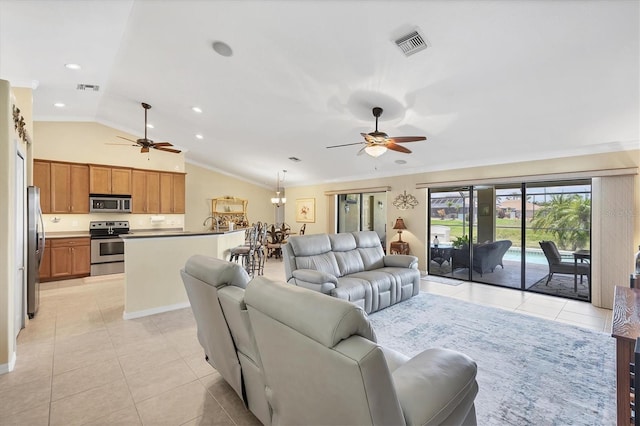 39 Tournament Rd, Rotonda West, FL 33947 - living area featuring ceiling fan, light tile patterned flooring, lofted ceiling, crown molding, and a chandelier
