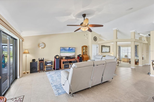 39 Tournament Rd, Rotonda West, FL 33947 - living area with crown molding, light tile patterned flooring, ceiling fan, baseboards, and lofted ceiling