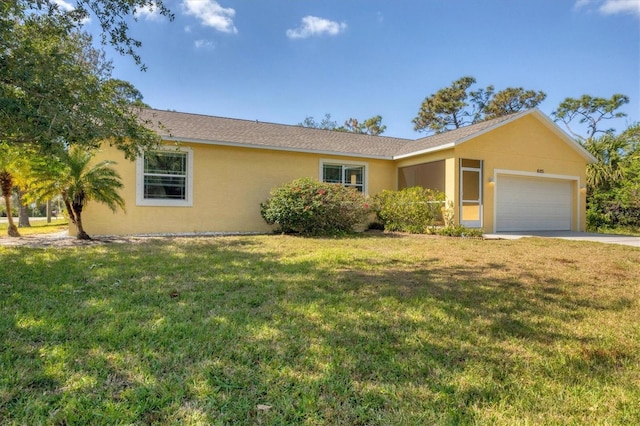 single story home with a garage and a front yard