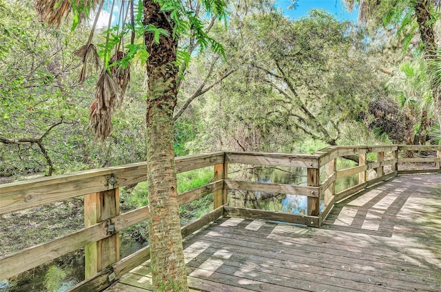 deck featuring a water view