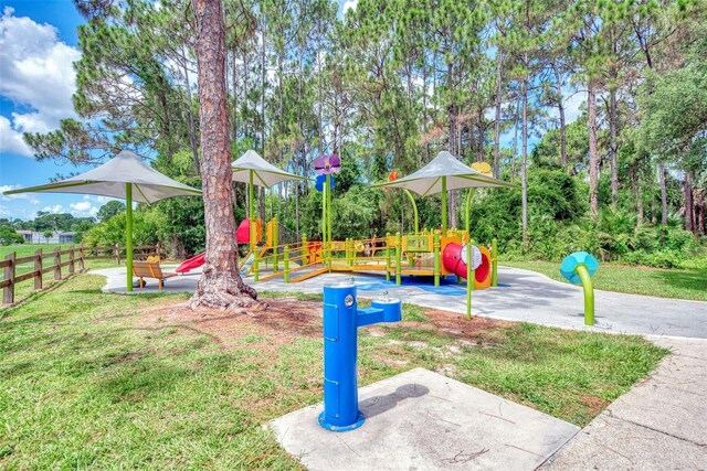 view of playground with a yard