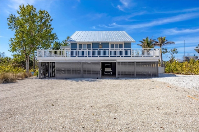 view of front of home with a wooden deck