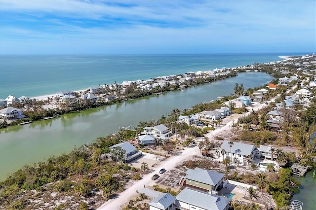 bird's eye view with a water view and a residential view