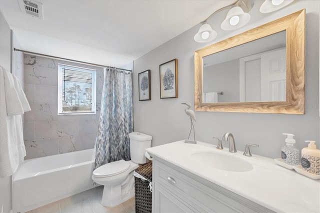 full bath with visible vents, shower / tub combo with curtain, vanity, and toilet