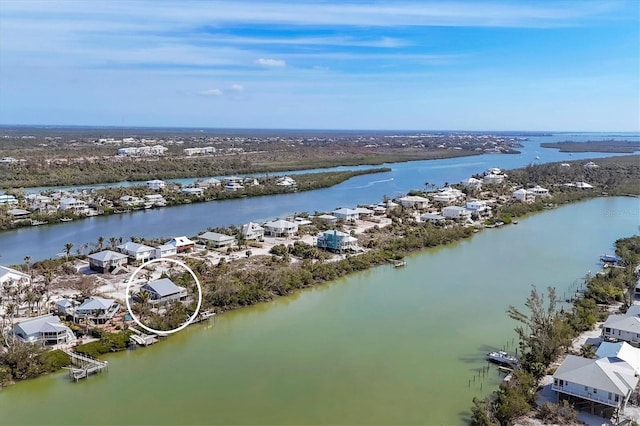 aerial view with a water view and a residential view