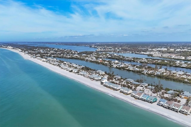 bird's eye view with a view of the beach and a water view