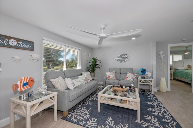 living room featuring ceiling fan