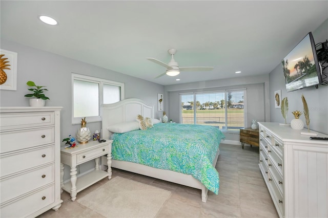 tiled bedroom with ceiling fan