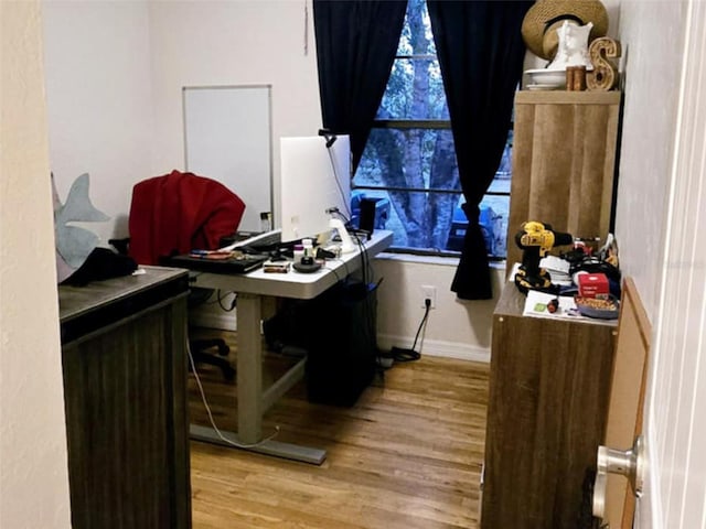 office space featuring light hardwood / wood-style floors