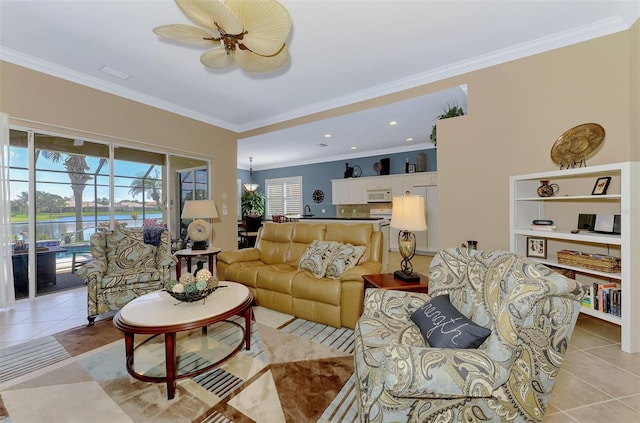 tiled living room featuring crown molding and ceiling fan