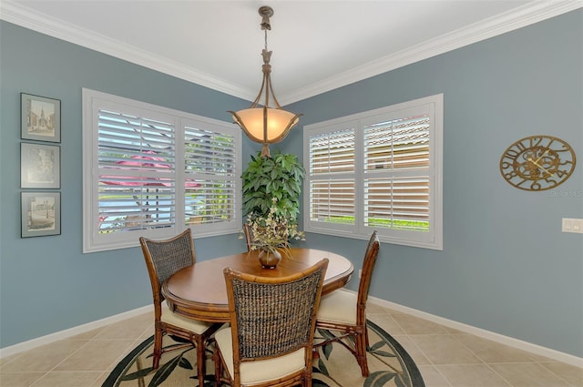 dining room with crown molding, a wealth of natural light, and light tile patterned floors