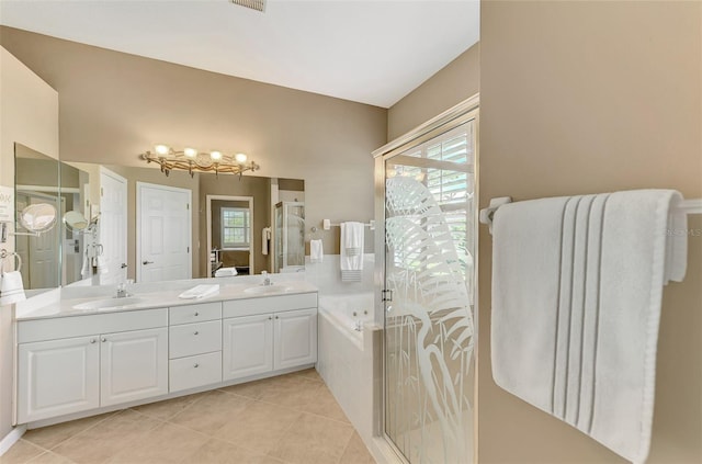 bathroom featuring plenty of natural light, separate shower and tub, tile patterned flooring, and vanity