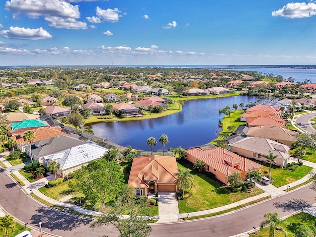 drone / aerial view with a water view