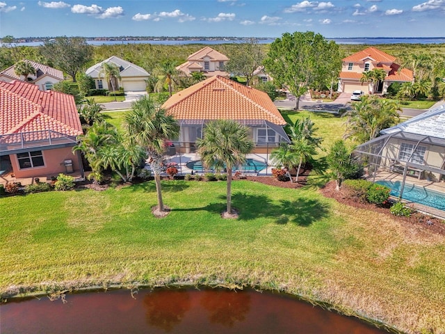 drone / aerial view featuring a water view