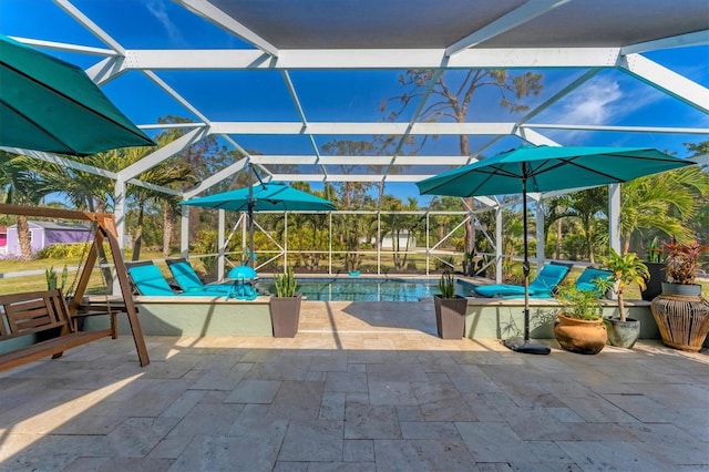 view of patio / terrace with a lanai