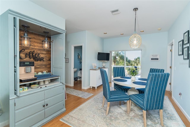 dining area featuring light hardwood / wood-style flooring