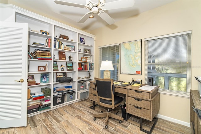 office space with ceiling fan