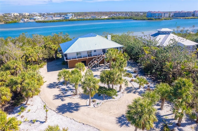 drone / aerial view with a water view