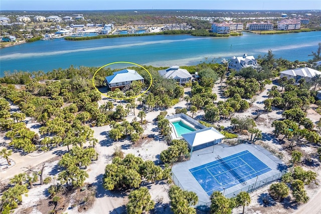 birds eye view of property featuring a water view