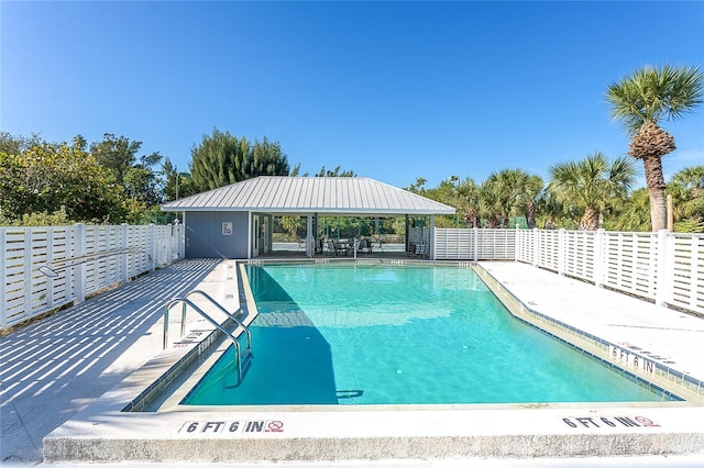 view of pool with a gazebo and a patio