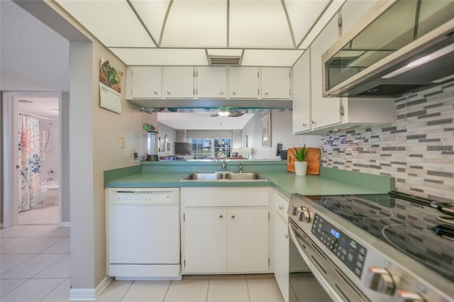 kitchen with stainless steel electric range oven, dishwasher, sink, and white cabinetry