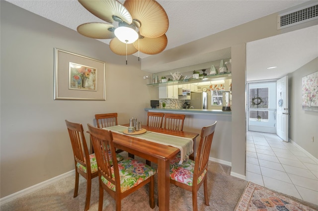 view of tiled dining space