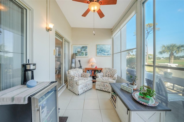 sunroom with beverage cooler and ceiling fan