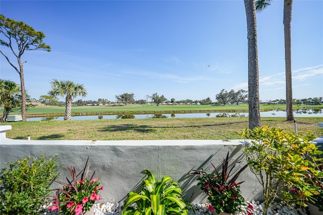 view of patio with a water view