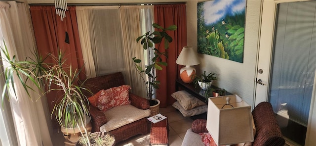 sitting room featuring tile patterned floors