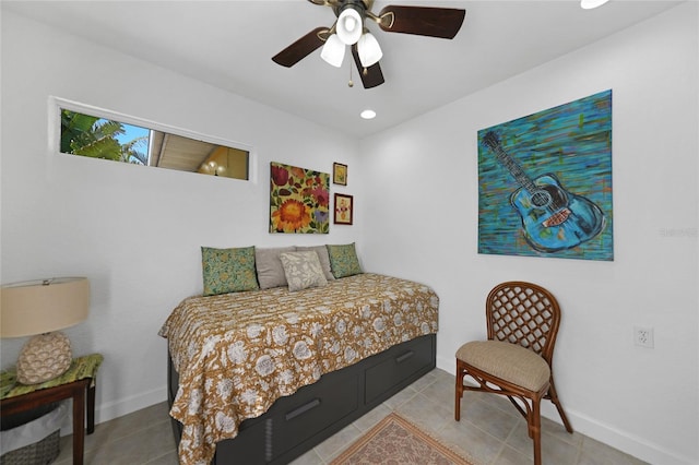 bedroom with light tile patterned floors and ceiling fan