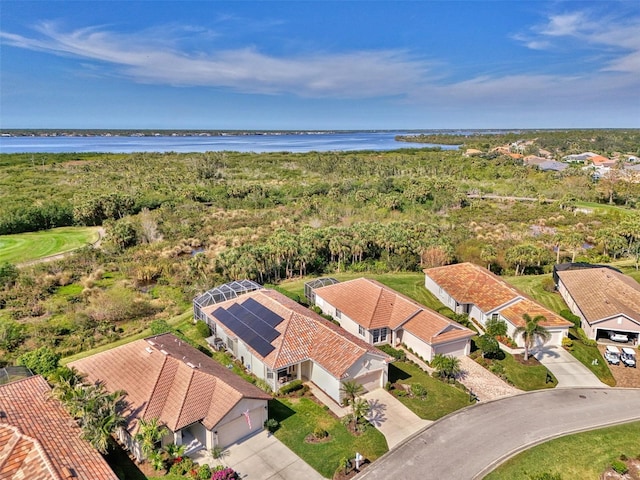 drone / aerial view with a water view