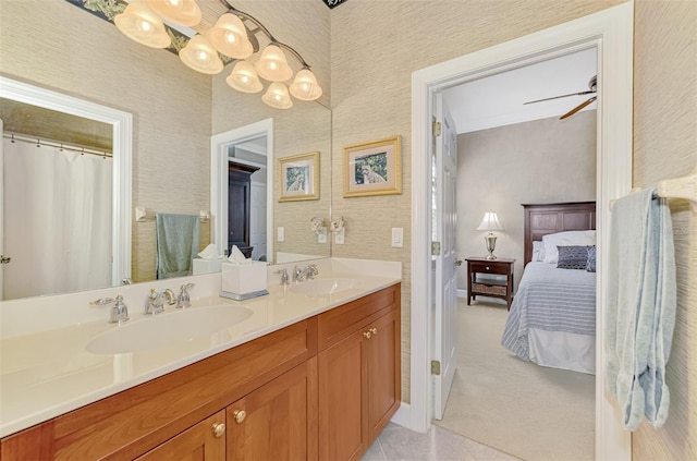 bathroom featuring ceiling fan, vanity, and tile patterned floors