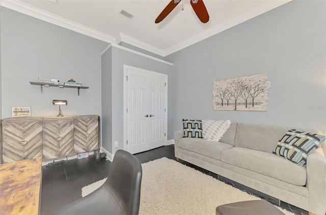 living room with wood-type flooring, ornamental molding, and ceiling fan