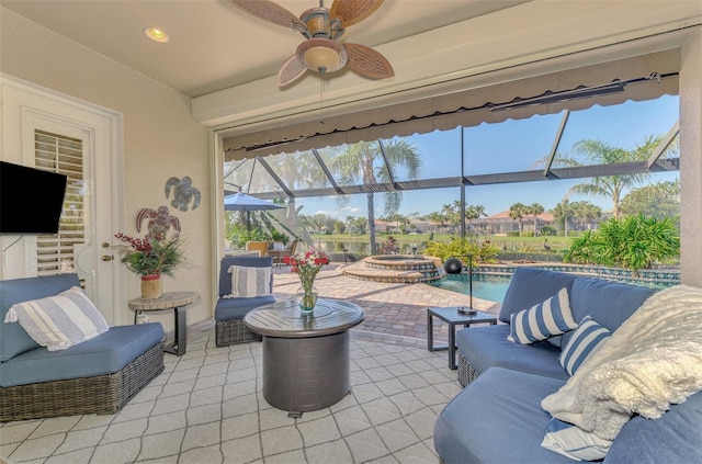 view of patio / terrace with ceiling fan, an outdoor hangout area, a pool with hot tub, and glass enclosure