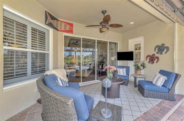 view of patio with an outdoor hangout area and ceiling fan