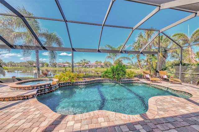 view of pool featuring a lanai, a patio area, a water view, and an in ground hot tub