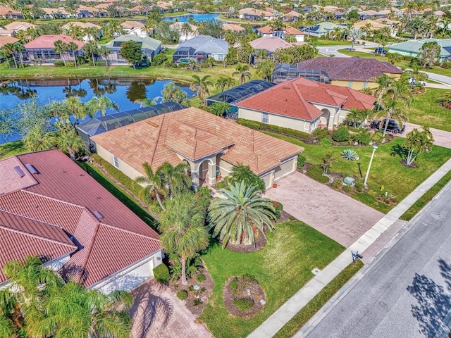 drone / aerial view with a water view