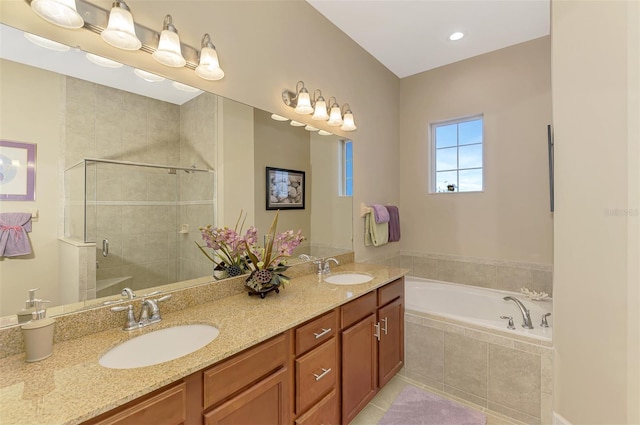 bathroom with vanity, tile patterned floors, and independent shower and bath