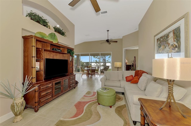 tiled living room with high vaulted ceiling and ceiling fan