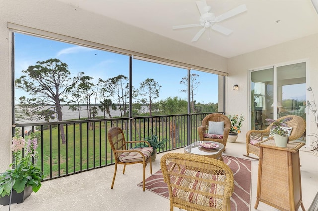 sunroom / solarium with ceiling fan