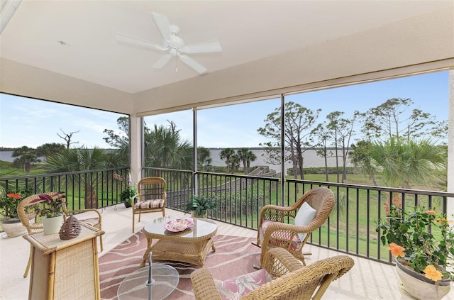 sunroom / solarium with ceiling fan