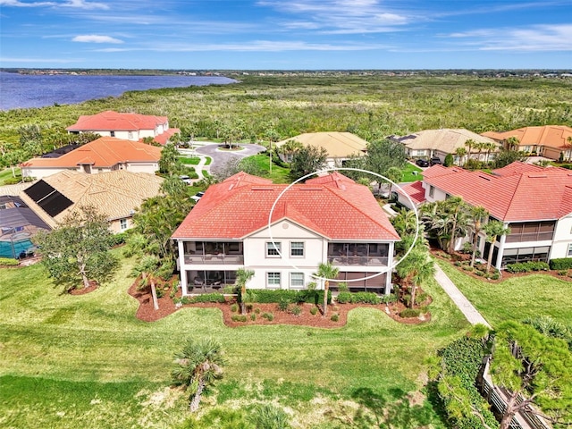 bird's eye view with a water view