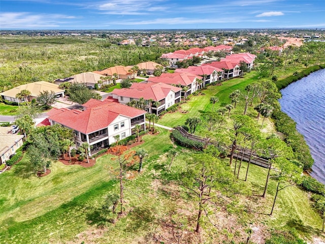 drone / aerial view with a water view